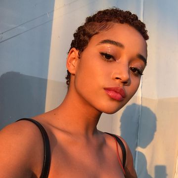 instagram of amanda stenberg looking at the camera with a short curly hair cut instagram of amanda stenberg looking at the camera with a short curly hair cut